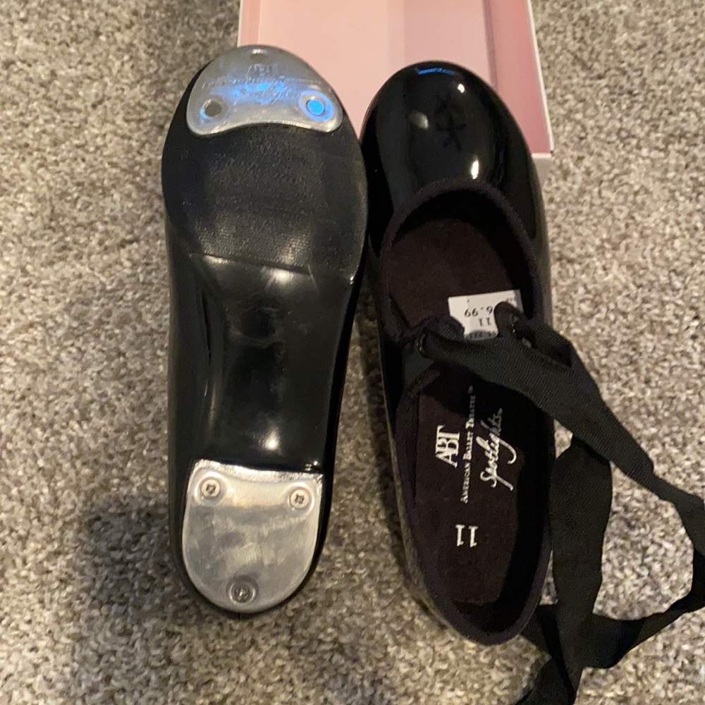 Toddler size 11 tap dance shoes.